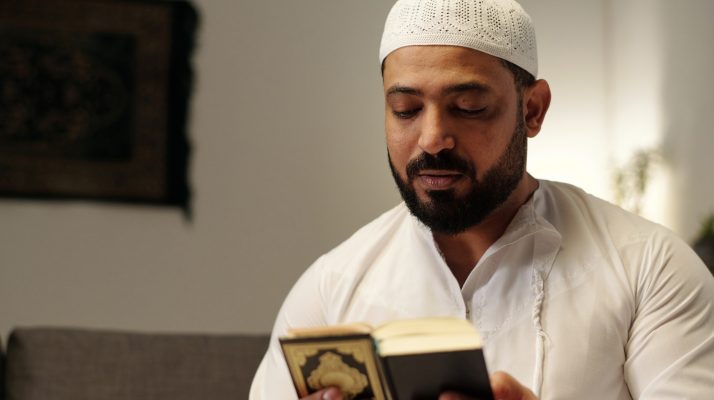 Bearded Muslim Reading Quran Book