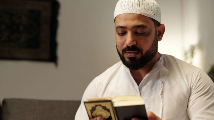 Bearded Muslim Reading Quran Book