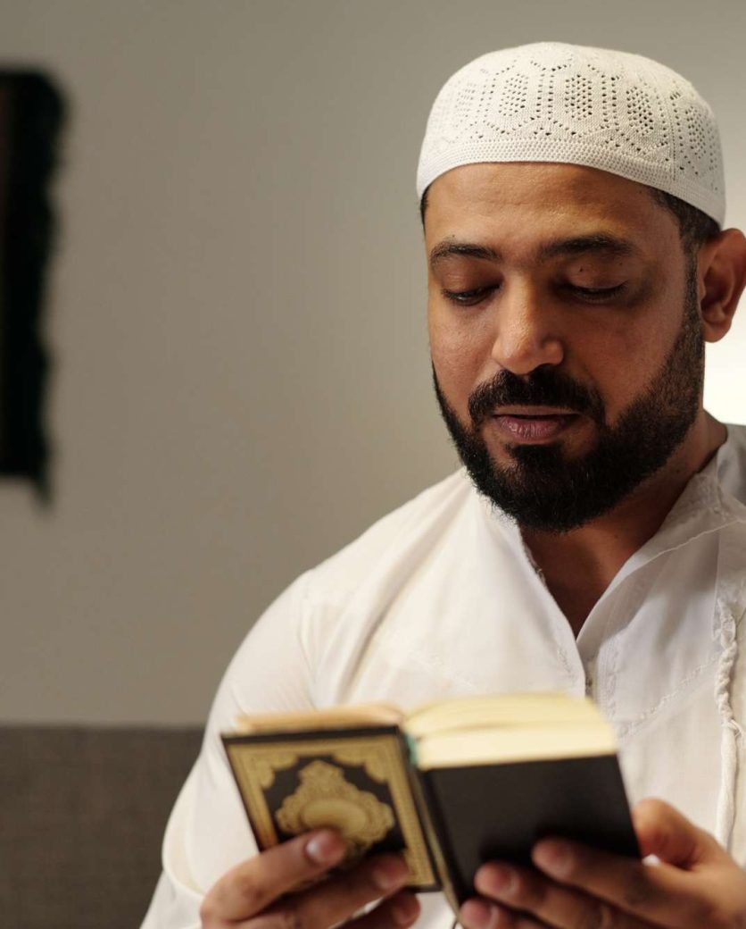 Bearded Muslim Reading Quran Book